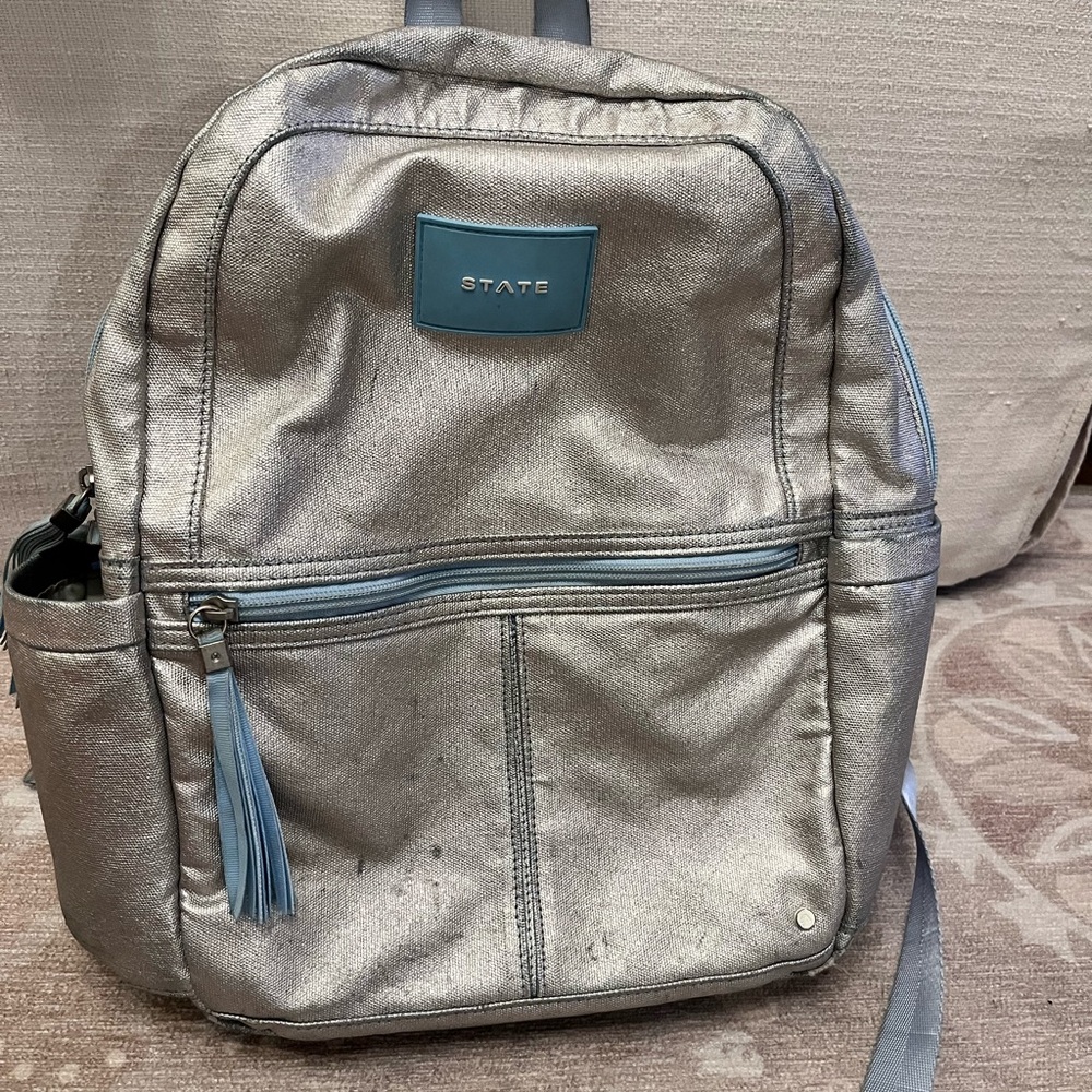 STATE Shimmering Silver Backpack with Blue Details